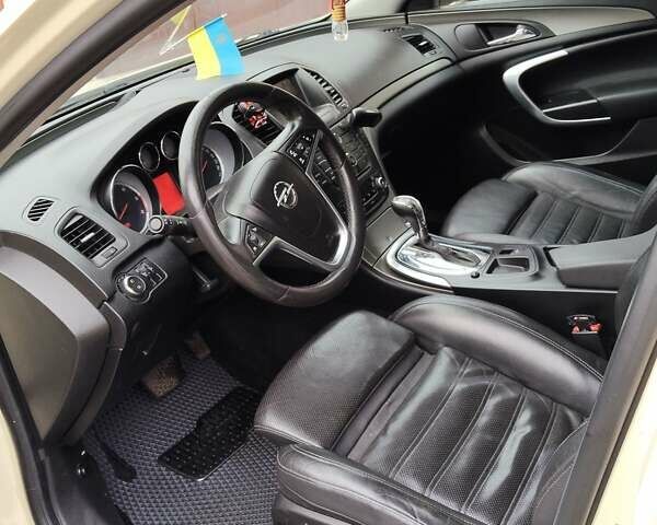 Желтый Опель Инсигния, объемом двигателя 1.96 л и пробегом 252 тыс. км за 8100 $, фото 7 на Automoto.ua