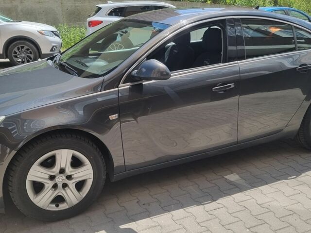 Серый Опель Инсигния, объемом двигателя 2 л и пробегом 188 тыс. км за 8800 $, фото 6 на Automoto.ua