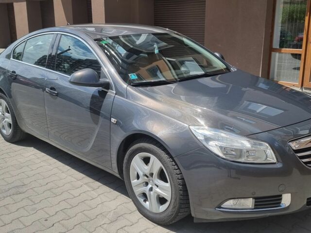 Серый Опель Инсигния, объемом двигателя 2 л и пробегом 188 тыс. км за 8800 $, фото 5 на Automoto.ua