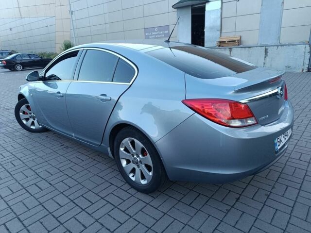 Сірий Опель Інсігнія, об'ємом двигуна 2 л та пробігом 293 тис. км за 6700 $, фото 4 на Automoto.ua