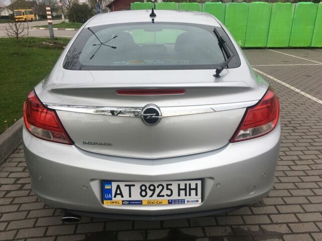 Серый Опель Инсигния, объемом двигателя 1.8 л и пробегом 100 тыс. км за 5700 $, фото 2 на Automoto.ua