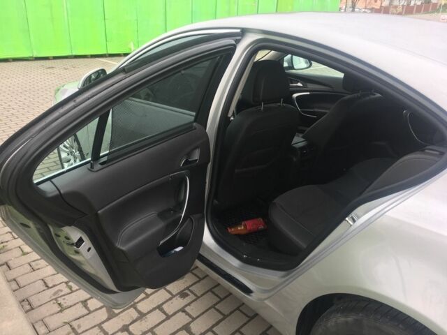 Серый Опель Инсигния, объемом двигателя 1.8 л и пробегом 100 тыс. км за 5700 $, фото 7 на Automoto.ua