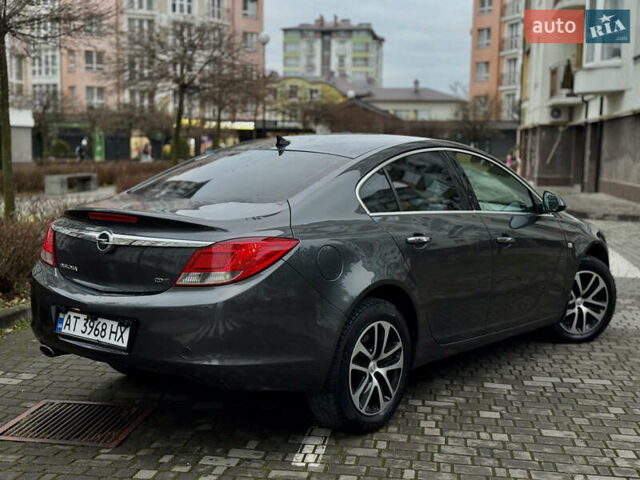 Сірий Опель Інсігнія, об'ємом двигуна 1.96 л та пробігом 265 тис. км за 7500 $, фото 4 на Automoto.ua
