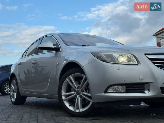 Сірий Опель Інсігнія, об'ємом двигуна 2 л та пробігом 219 тис. км за 7800 $, фото 1 на Automoto.ua