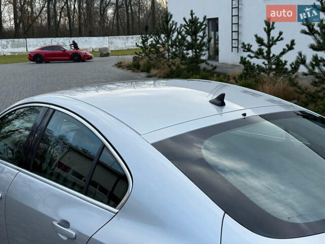 Сірий Опель Інсігнія, об'ємом двигуна 2 л та пробігом 219 тис. км за 7800 $, фото 50 на Automoto.ua