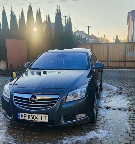 Серый Опель Инсигния, объемом двигателя 1.96 л и пробегом 313 тыс. км за 6700 $, фото 4 на Automoto.ua
