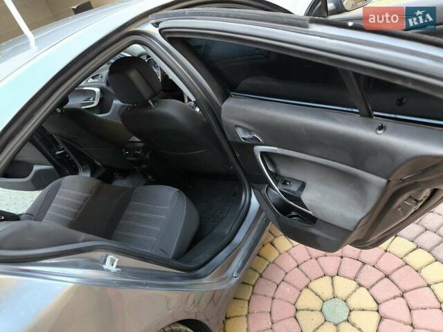 Серый Опель Инсигния, объемом двигателя 1.96 л и пробегом 250 тыс. км за 6000 $, фото 13 на Automoto.ua