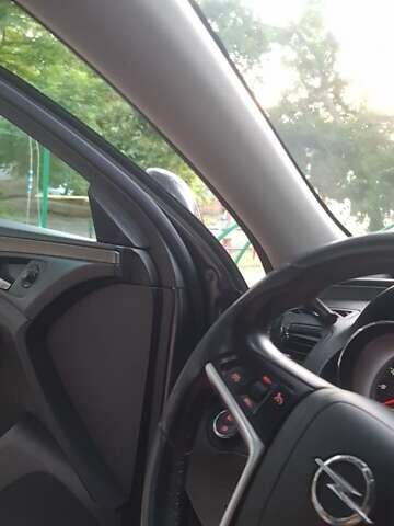 Серый Опель Инсигния, объемом двигателя 2 л и пробегом 221 тыс. км за 7700 $, фото 14 на Automoto.ua