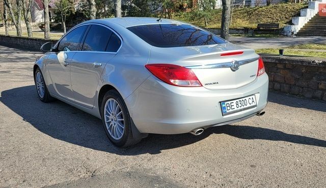 Серый Опель Инсигния, объемом двигателя 2 л и пробегом 179 тыс. км за 8800 $, фото 4 на Automoto.ua