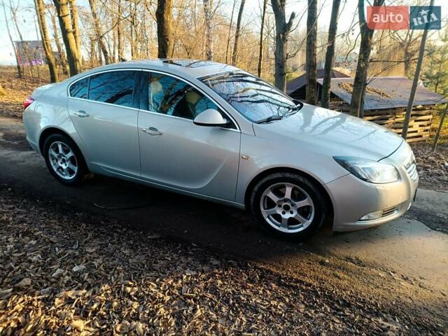 Серый Опель Инсигния, объемом двигателя 2 л и пробегом 234 тыс. км за 6800 $, фото 3 на Automoto.ua