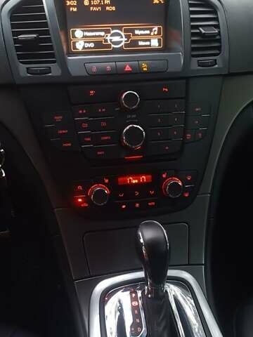 Серый Опель Инсигния, объемом двигателя 2 л и пробегом 221 тыс. км за 7700 $, фото 4 на Automoto.ua