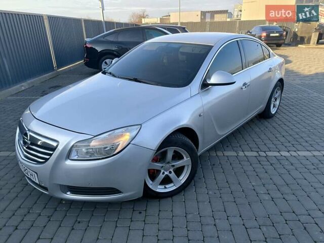 Серый Опель Инсигния, объемом двигателя 1.96 л и пробегом 350 тыс. км за 6300 $, фото 4 на Automoto.ua