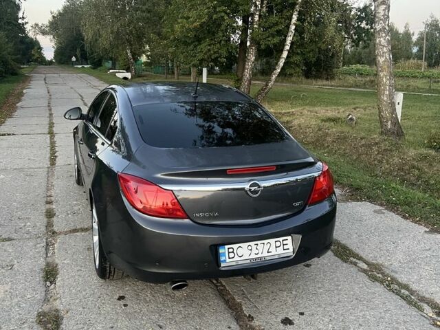 Серый Опель Инсигния, объемом двигателя 2 л и пробегом 290 тыс. км за 5800 $, фото 4 на Automoto.ua