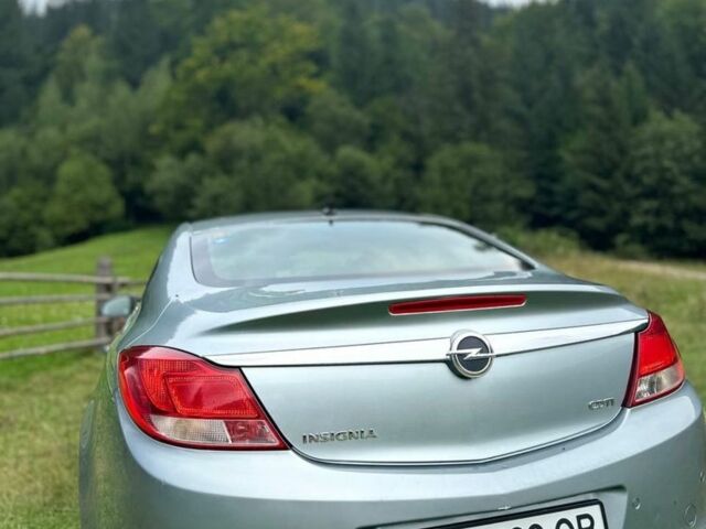 Сірий Опель Інсігнія, об'ємом двигуна 2 л та пробігом 200 тис. км за 6100 $, фото 1 на Automoto.ua