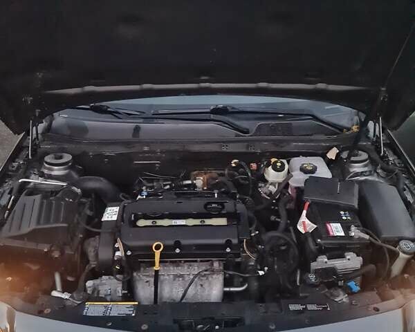 Сірий Опель Інсігнія, об'ємом двигуна 1.8 л та пробігом 245 тис. км за 5999 $, фото 18 на Automoto.ua