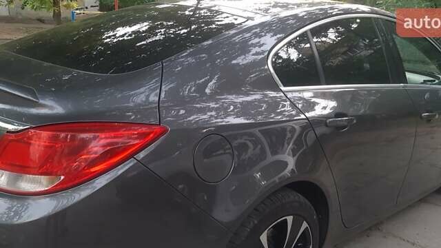 Серый Опель Инсигния, объемом двигателя 2 л и пробегом 221 тыс. км за 7700 $, фото 2 на Automoto.ua