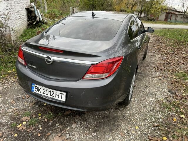 Серый Опель Инсигния, объемом двигателя 1.8 л и пробегом 174 тыс. км за 6499 $, фото 3 на Automoto.ua