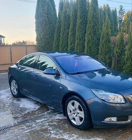 Серый Опель Инсигния, объемом двигателя 1.96 л и пробегом 313 тыс. км за 6700 $, фото 2 на Automoto.ua