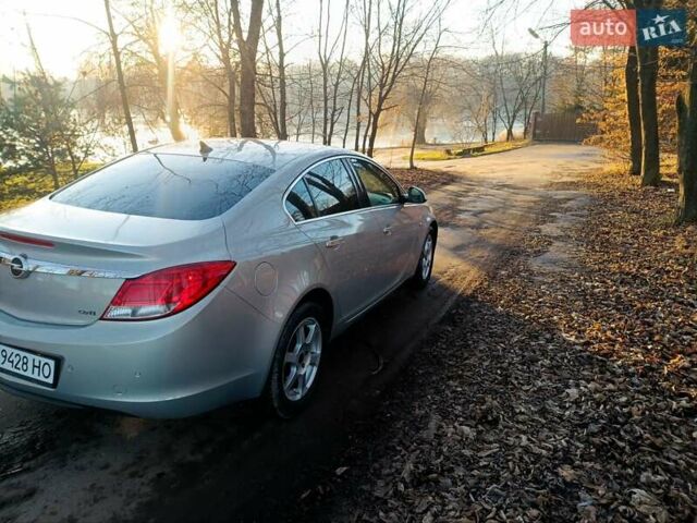 Серый Опель Инсигния, объемом двигателя 2 л и пробегом 234 тыс. км за 6800 $, фото 4 на Automoto.ua