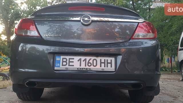 Серый Опель Инсигния, объемом двигателя 2 л и пробегом 221 тыс. км за 7700 $, фото 7 на Automoto.ua