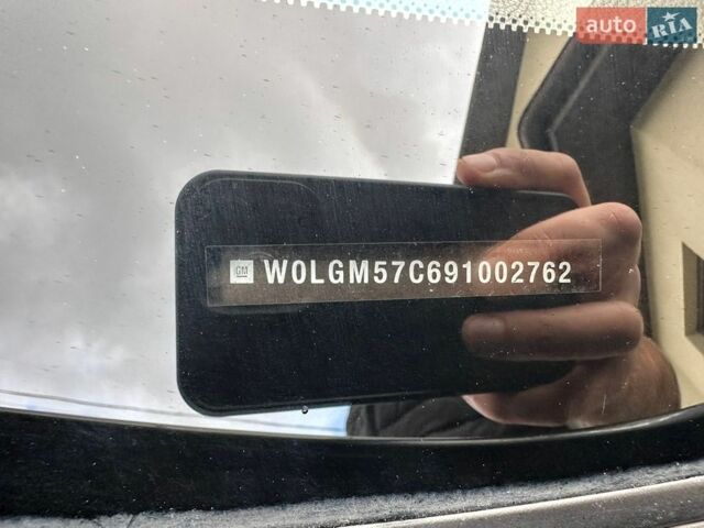 Сірий Опель Інсігнія, об'ємом двигуна 1.8 л та пробігом 219 тис. км за 7100 $, фото 19 на Automoto.ua