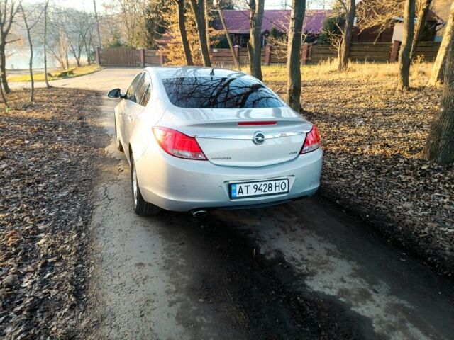 Серый Опель Инсигния, объемом двигателя 2 л и пробегом 235 тыс. км за 6800 $, фото 4 на Automoto.ua