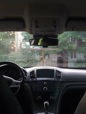 Серый Опель Инсигния, объемом двигателя 2 л и пробегом 221 тыс. км за 7700 $, фото 5 на Automoto.ua