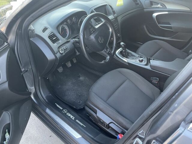 Серый Опель Инсигния, объемом двигателя 1.8 л и пробегом 174 тыс. км за 6499 $, фото 7 на Automoto.ua