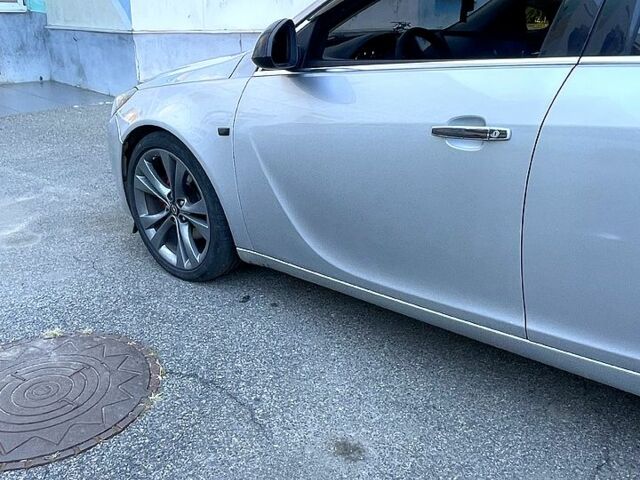 Сірий Опель Інсігнія, об'ємом двигуна 2 л та пробігом 350 тис. км за 7800 $, фото 2 на Automoto.ua