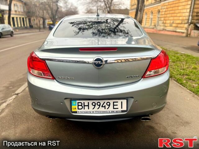 Серый Опель Инсигния, объемом двигателя 20 л и пробегом 202 тыс. км за 7200 $, фото 4 на Automoto.ua