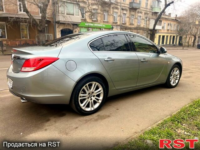 Серый Опель Инсигния, объемом двигателя 20 л и пробегом 202 тыс. км за 7200 $, фото 5 на Automoto.ua