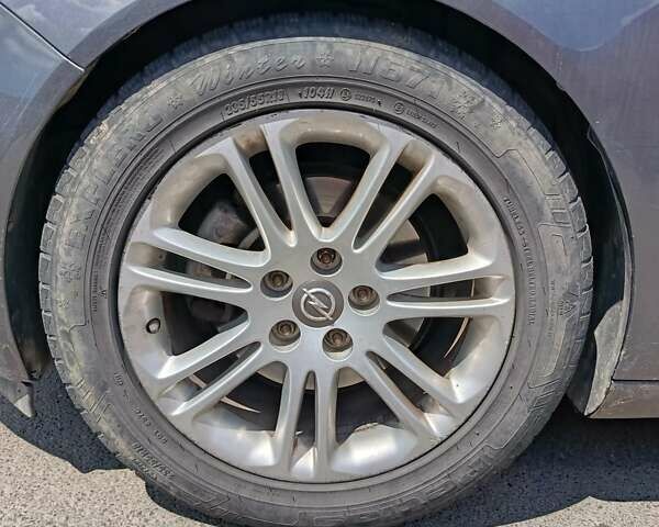 Сірий Опель Інсігнія, об'ємом двигуна 1.96 л та пробігом 175 тис. км за 8000 $, фото 10 на Automoto.ua