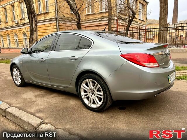 Серый Опель Инсигния, объемом двигателя 20 л и пробегом 202 тыс. км за 7200 $, фото 3 на Automoto.ua