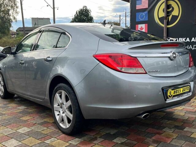 Серый Опель Инсигния, объемом двигателя 2 л и пробегом 217 тыс. км за 7900 $, фото 4 на Automoto.ua