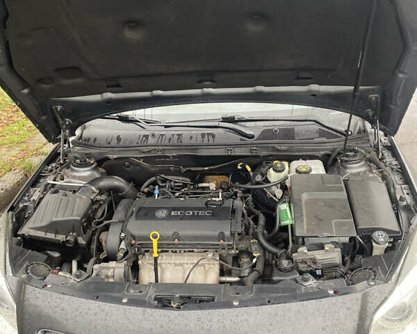 Сірий Опель Інсігнія, об'ємом двигуна 1.8 л та пробігом 213 тис. км за 9000 $, фото 6 на Automoto.ua