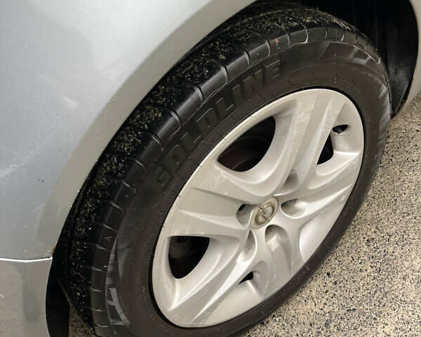 Серый Опель Инсигния, объемом двигателя 2 л и пробегом 260 тыс. км за 5500 $, фото 18 на Automoto.ua