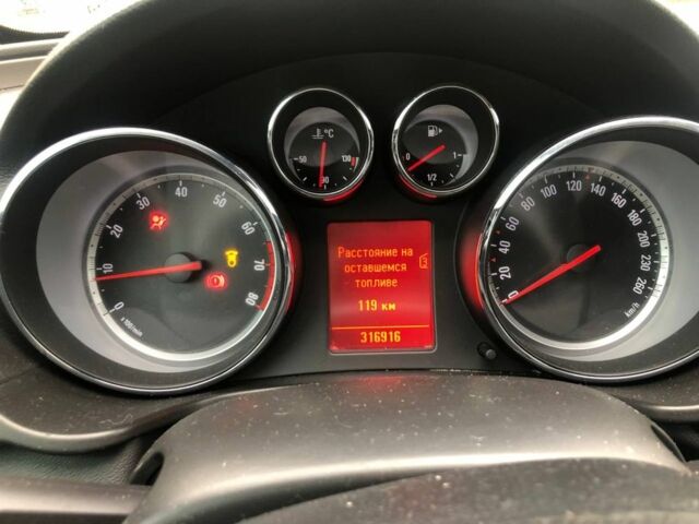 Серый Опель Инсигния, объемом двигателя 1.8 л и пробегом 317 тыс. км за 3600 $, фото 7 на Automoto.ua