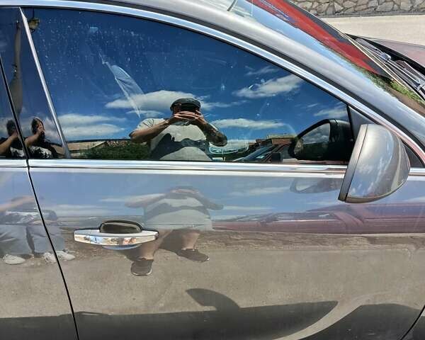 Сірий Опель Інсігнія, об'ємом двигуна 1.96 л та пробігом 175 тис. км за 8000 $, фото 8 на Automoto.ua