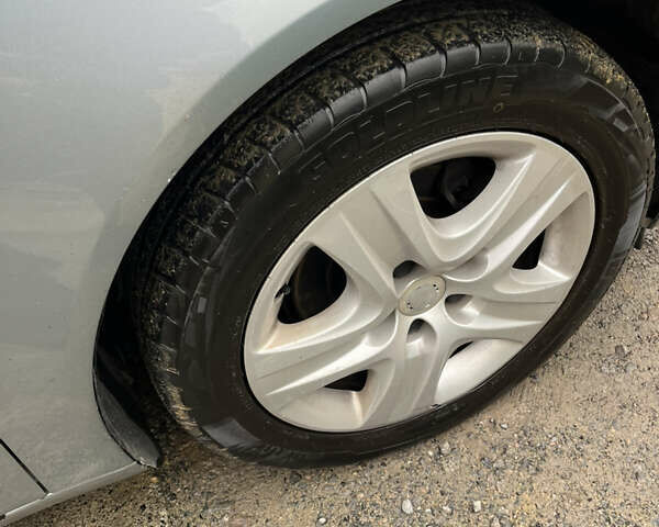 Серый Опель Инсигния, объемом двигателя 2 л и пробегом 260 тыс. км за 5500 $, фото 17 на Automoto.ua