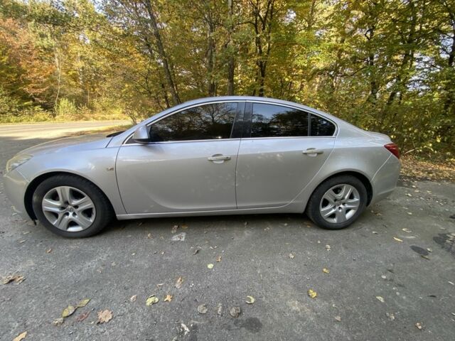 Серый Опель Инсигния, объемом двигателя 2 л и пробегом 280 тыс. км за 6500 $, фото 4 на Automoto.ua