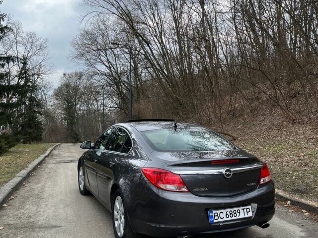 Сірий Опель Інсігнія, об'ємом двигуна 1.6 л та пробігом 260 тис. км за 7100 $, фото 4 на Automoto.ua