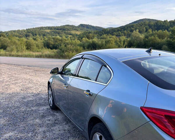 Серый Опель Инсигния, объемом двигателя 1.96 л и пробегом 216 тыс. км за 8500 $, фото 3 на Automoto.ua