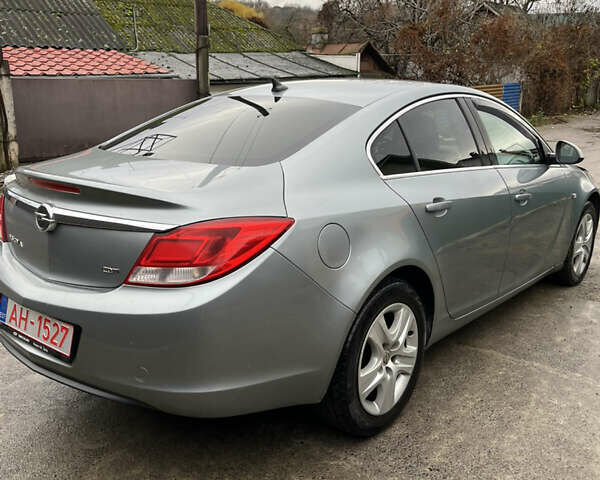 Серый Опель Инсигния, объемом двигателя 2 л и пробегом 260 тыс. км за 5500 $, фото 3 на Automoto.ua