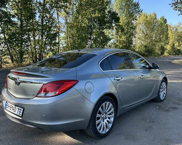 Сірий Опель Інсігнія, об'ємом двигуна 1.96 л та пробігом 258 тис. км за 8400 $, фото 2 на Automoto.ua