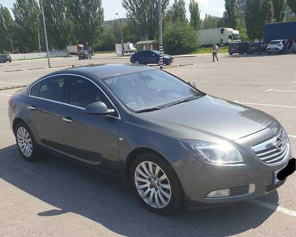 Сірий Опель Інсігнія, об'ємом двигуна 2 л та пробігом 150 тис. км за 10300 $, фото 3 на Automoto.ua