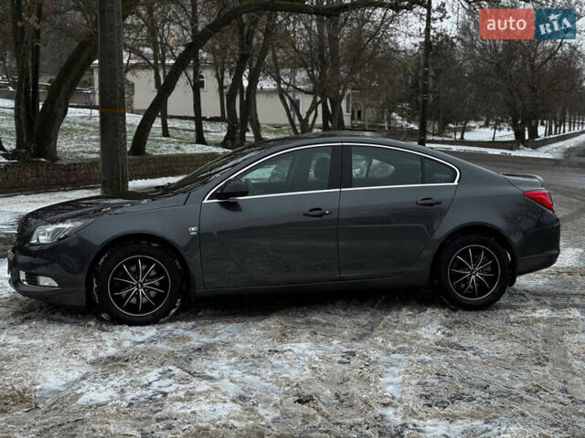Сірий Опель Інсігнія, об'ємом двигуна 2 л та пробігом 90 тис. км за 10300 $, фото 2 на Automoto.ua
