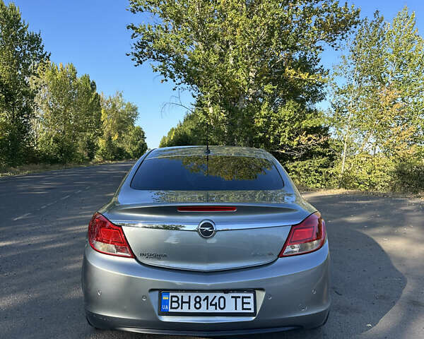 Сірий Опель Інсігнія, об'ємом двигуна 1.96 л та пробігом 258 тис. км за 8400 $, фото 1 на Automoto.ua