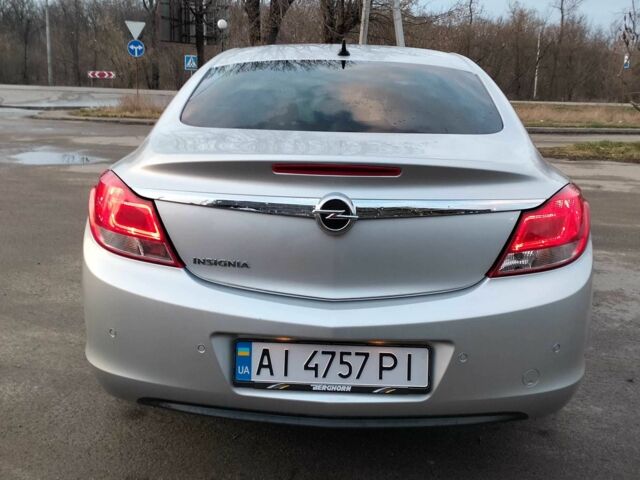 Серый Опель Инсигния, объемом двигателя 1.8 л и пробегом 152 тыс. км за 8700 $, фото 5 на Automoto.ua