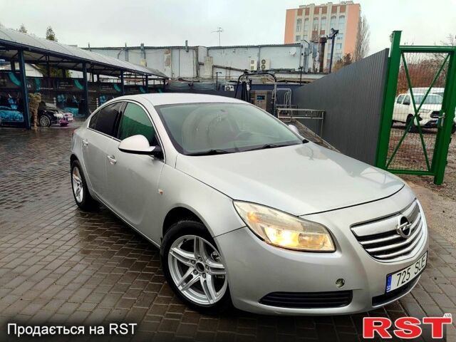 Серый Опель Инсигния, объемом двигателя 2 л и пробегом 160 тыс. км за 4000 $, фото 1 на Automoto.ua