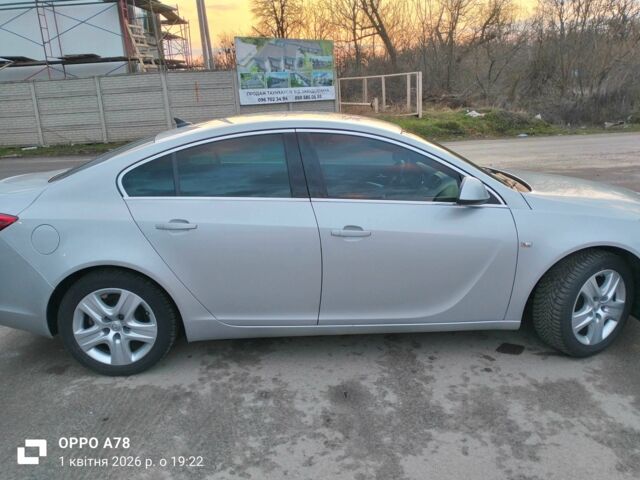 Серый Опель Инсигния, объемом двигателя 1.8 л и пробегом 152 тыс. км за 8700 $, фото 6 на Automoto.ua